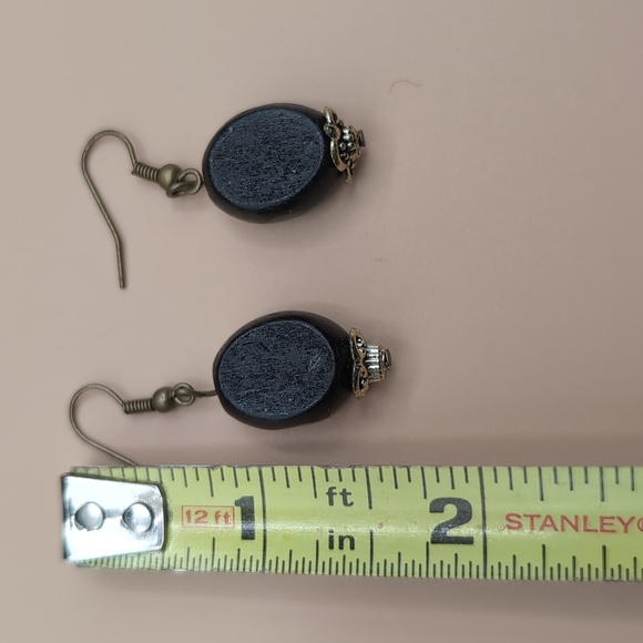 Gold Toned Drop Dangle Earrings With Black Wooden Beaded Focus - Picture 7 of 8